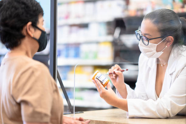 Pharmacist helping a client