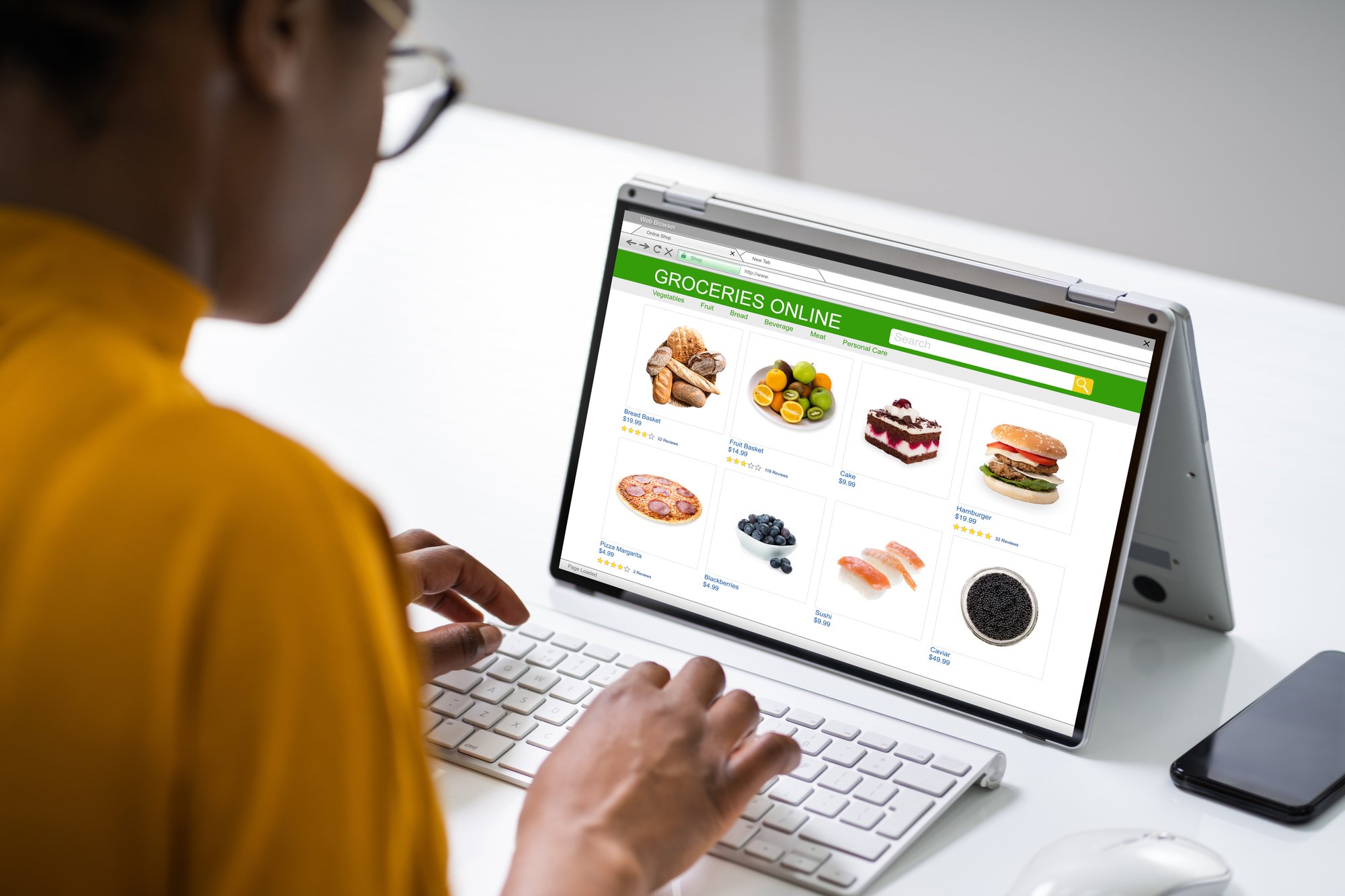 Woman looking to order food on a screen